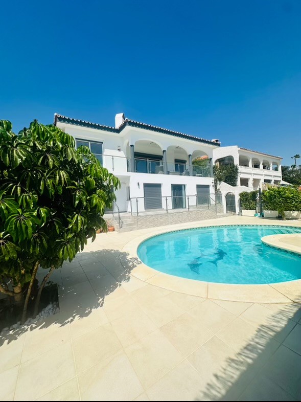 Villa exterior with pool